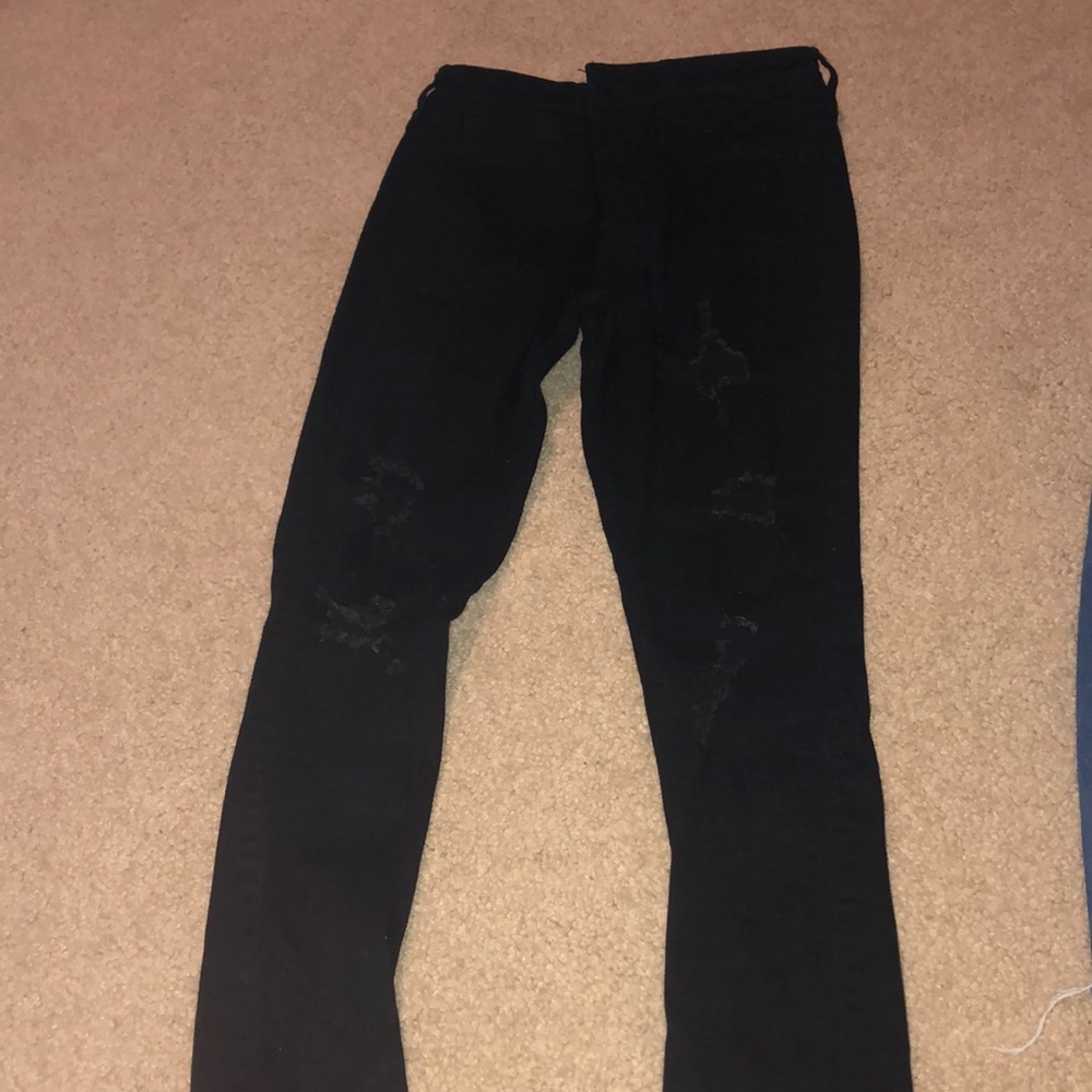Black ripped jeans